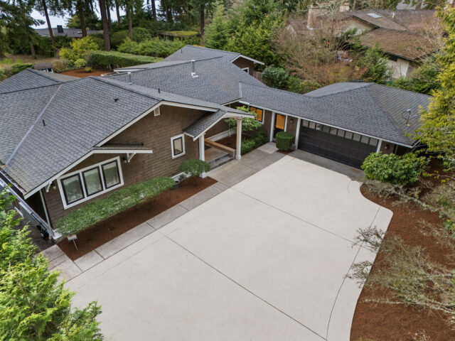 Clean driveway and walkway after power washing on Bellevue property