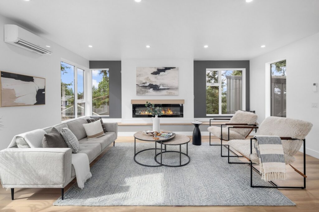 Seattle home staging in a new construction townhome living room with a linear fireplace