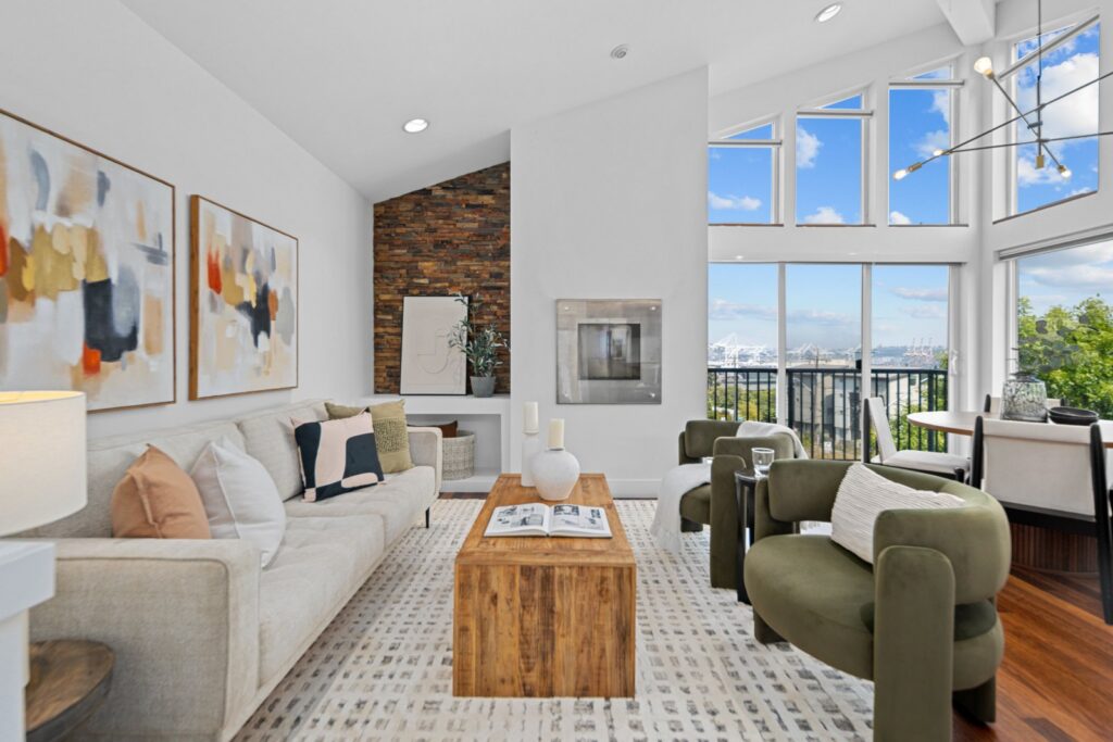 Seattle home staging in a West Seattle living room with a modern sofa and large-scale art