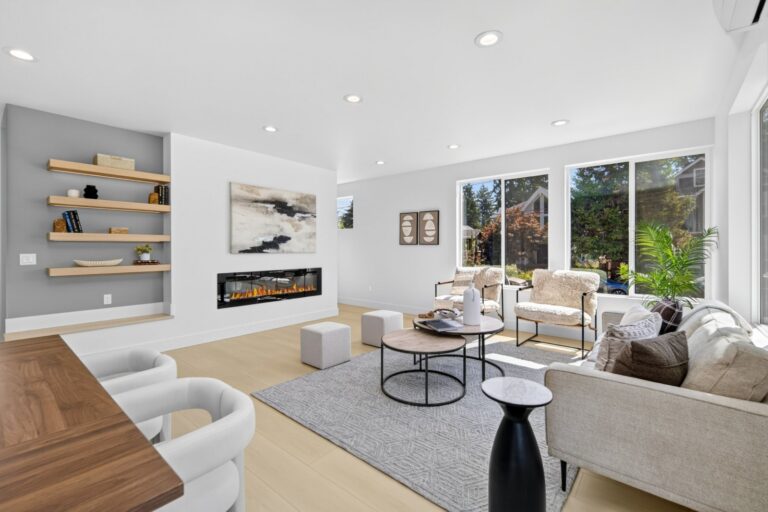 Living room with a fireplace, staged by a home stager for a Seattle listing